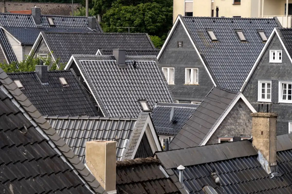Steep roof eaves and gutter lines on houses in Yuma, AZ